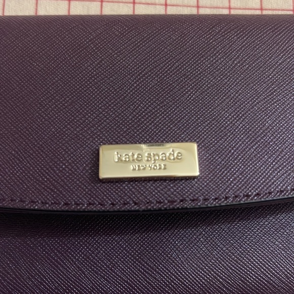 Never used Kate Spade wine color wristlet with phone holder and wallet - Picture 3 of 6